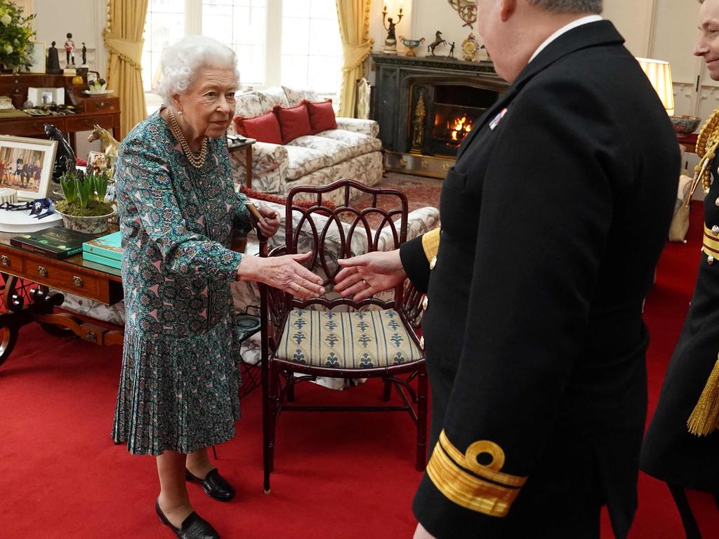 Last week, the Queen carried a cane as she welcomed outgoing Defence Service Secretaries Rear Admiral James Macleod and incoming Defence Service Secretaries Major General Eldon Millar during an in-person audience at Windsor Castle. Picture: Steve Parsons / POOL / AFP