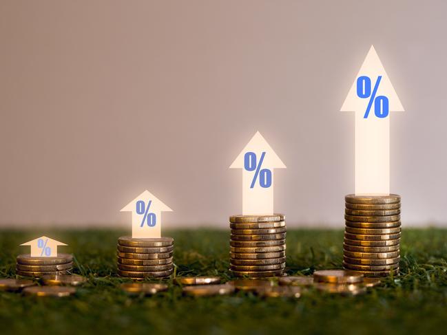 Growing Money, business finance and saving money investment, coin stack growing graph with tree plant growing up on coins. savings for your child.children saving and investment concept. interest rate rise generic