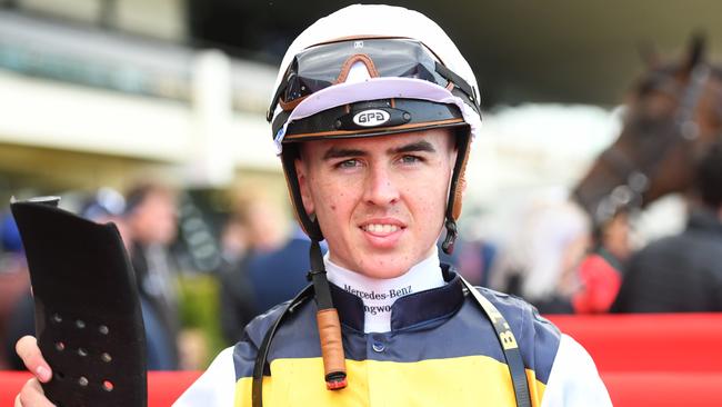 Jockey Ben Thompson returns to scale after riding Selica to victory in race 2, the Clanbrooke Racing Handicap, during Sandown Twilight Races at Sandown Racecourse in Melbourne, Wednesday, February 19, 2020. (AAP Image/Vince Caligiuri)