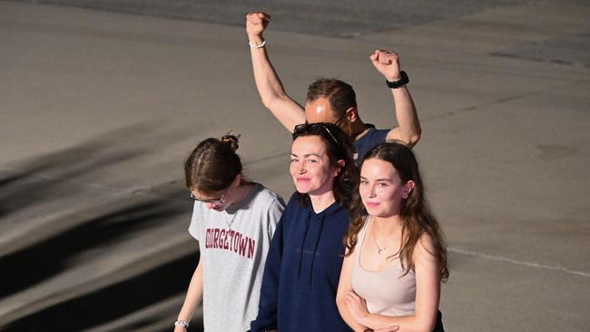 Alsu Kurmasheva (C) walks with her husband Pavel Butorin and their daughters Miriam Butorin and Bibi Butorinas at Joint Base Andrews in Maryland on August 1, 2024. Picture: Roberto Schmidt/AFP