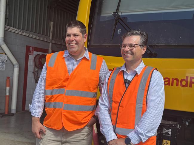State member for Maryborough John  Barounis and Minister for Transport and Main Roads Brent Mickelberg at Maryborough's Downer rail factory.
