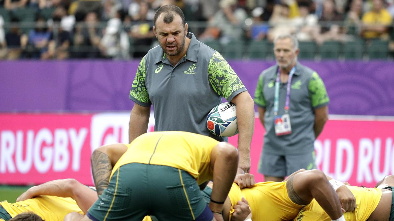 Australian coach Michael Cheika has a couple of concerns to address ahead of their final pool game. (AP Photo/Aaron Favila)