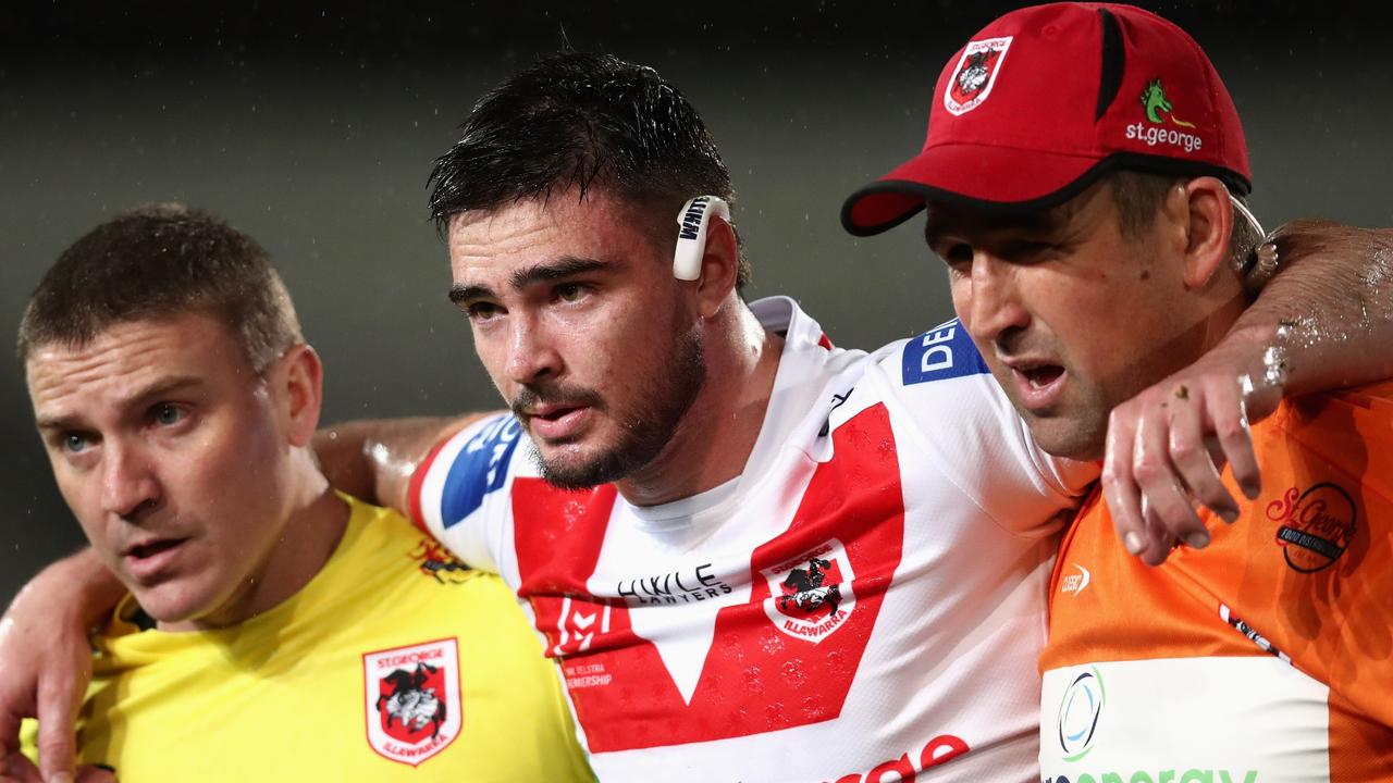 SYDNEY, AUSTRALIA - JULY 22: Cody Ramsey of the Dragons is assisted from the field after injuring his knee during the round 19 NRL match between the St George Illawarra Dragons and the Manly Warringah Sea Eagles at Netstrata Jubilee Stadium, on July 22, 2022, in Sydney, Australia. (Photo by Jason McCawley/Getty Images)