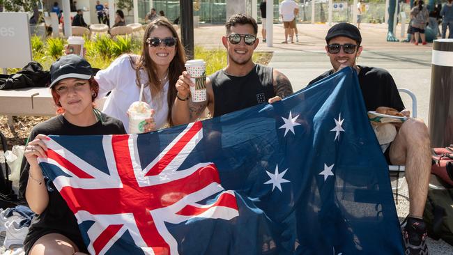 Argentinian tourists Aylen Desiervi (l to r), Fernanda Labissier, Nicolas Ovejero and Rodrigo Zaniratto get ready to celebrate. Picture: NCA NewsWire / Brendan Read