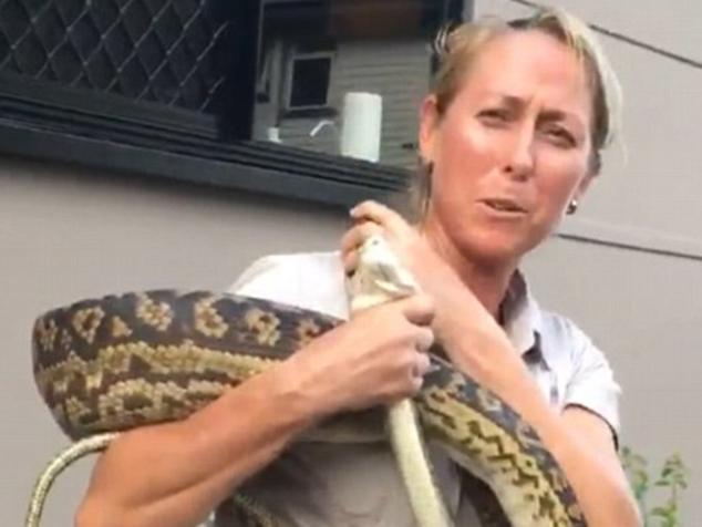 Brydie Maro ctaches python after it ate family cat Source Facebook/Brydie Maro