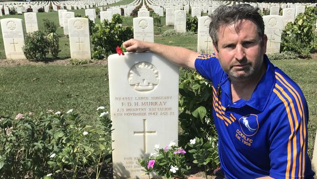 Greg Warren at the grave of Fred Murray, brother of former Camden Deputy Mayor John Murray.