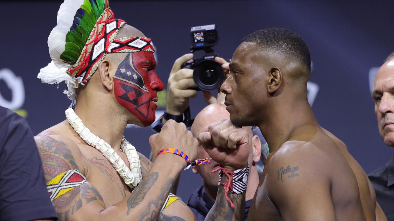 LAS VEGAS, NEVADA - APRIL 12: L-R) Opponents Alex Pereira of Brazil and Jamahal Hill face off during the UFC 300 ceremonial weigh-in at MGM Grand Garden Arena on April 12, 2024 in Las Vegas, Nevada. (Photo by Carmen Mandato/Getty Images)