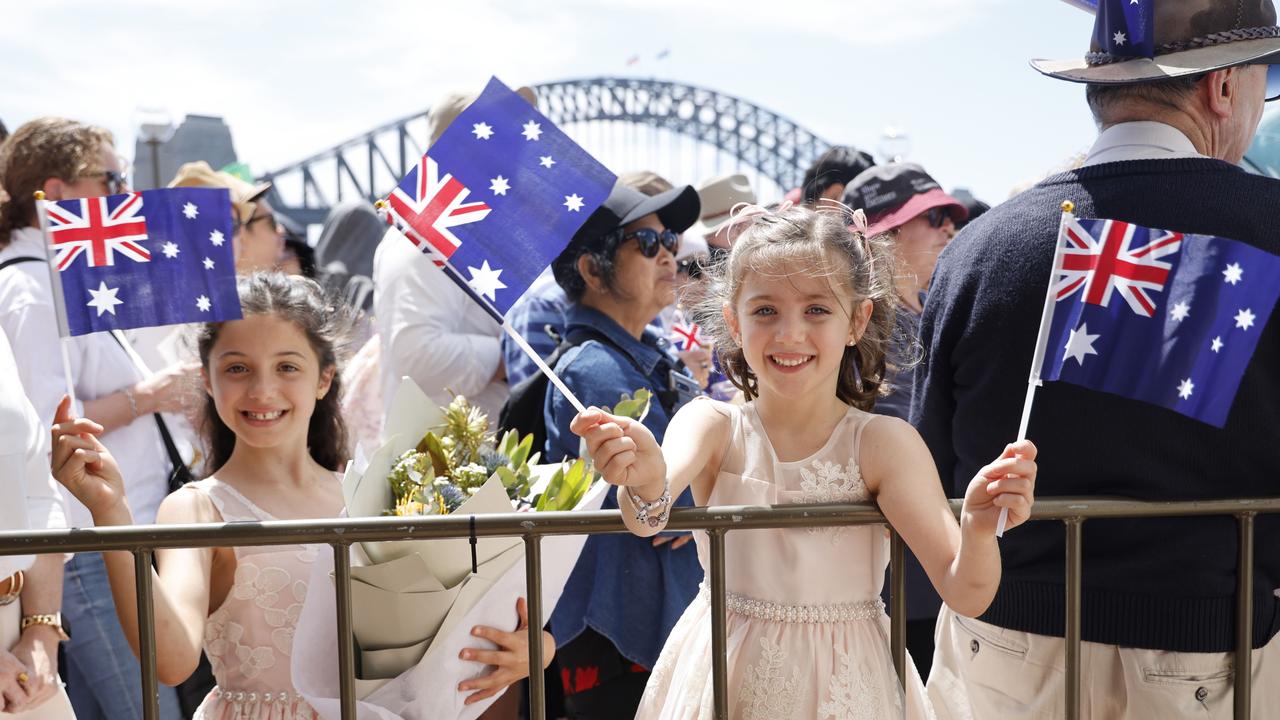 Royal fans Grace Wright (9) and Charlotte Finn (6) are eager to see the King and Queen outside the Sydney Opera House. Picture: NewsWire / Damian Shaw