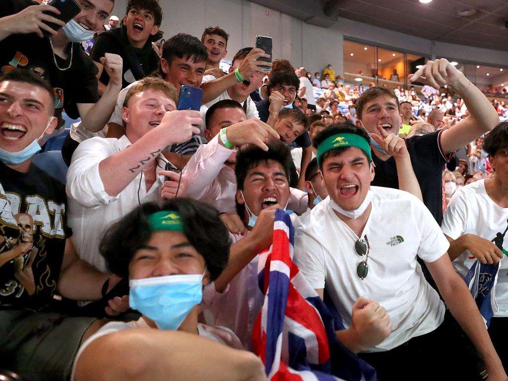 MELBOURNE, AUSTRALIA - JANUARY 20: Fans show support for Nick Kyrgios of Australia in his match against Daniil Medvedev of Russia during day four of the 2022 Australian Open at Melbourne Park on January 20, 2022 in Melbourne, Australia. (Photo by Kelly Defina/Getty Images)