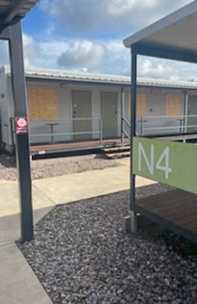 Several windows were smashed and boarded up at the Howard Springs facility after it housed flood evacuees from Kalkarindji, Pigeon Hole and Daguragu. Picture: Supplied