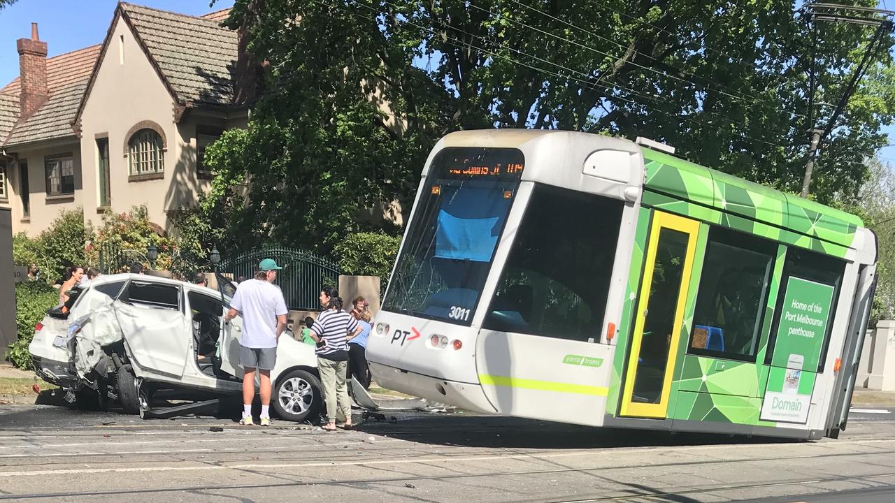 Kew accident: Car crash derails tram in Melbourne’s east on Cotham Road ...