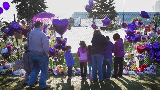 Music fans visit a memorial created outside Paisley Park. Picture: AFP