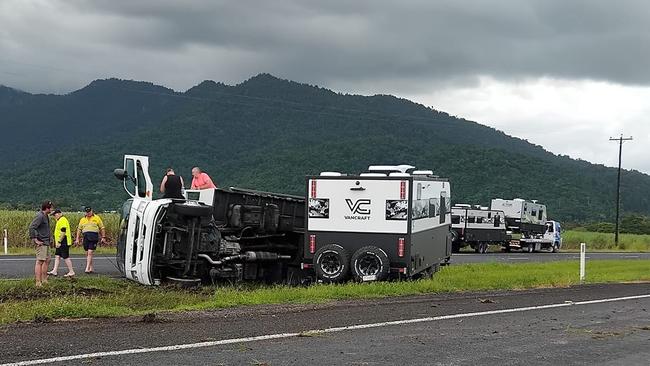 A truck carrying and towing caravans rolled on the Bruce Highway near Babinda on Saturday morning. Picture: Facebook