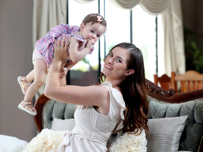 Aly Jordaan, 27, with 14-month-old daughter April discussing sleep deprivation. Picture: Tara Croser.