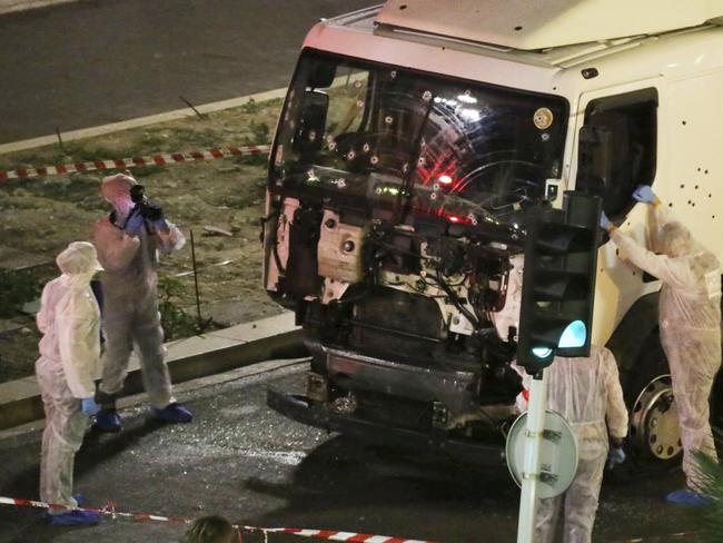 Authorities investigate a truck after it ploughed through Bastille Day revellers in the French resort city of Nice. Picture: Sasha Goldsmith via AP, File