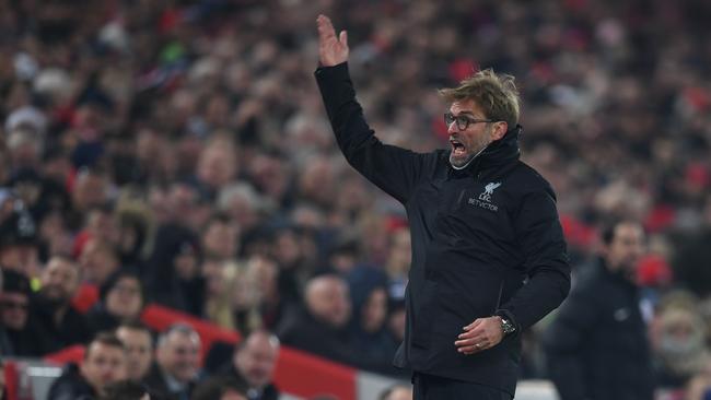Liverpool's German manager Jurgen Klopp gestures and shouts at the crowd.