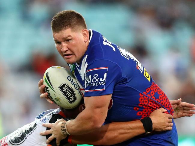 Bulldog Greg Eastwood  takes on the line during the round 8 NRL game between the Wests Tigers and the Canterbury Bulldogs at ANZ Stadium , Homebush . Picture : Gregg Porteous