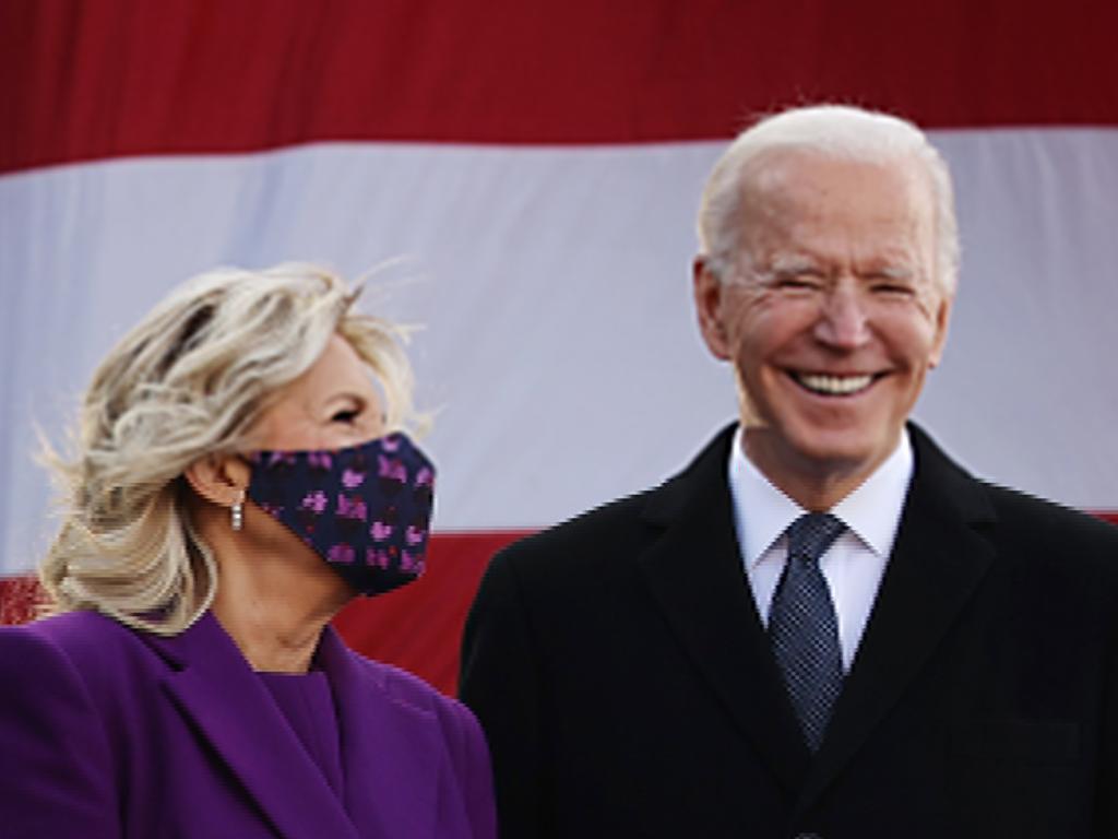 The day before taking office, Joe Biden and Dr Jill Biden participate in a departure ceremony at the Major Joseph “Beau” Biden III National Guard/Reserve Centre. Picture: Getty Images