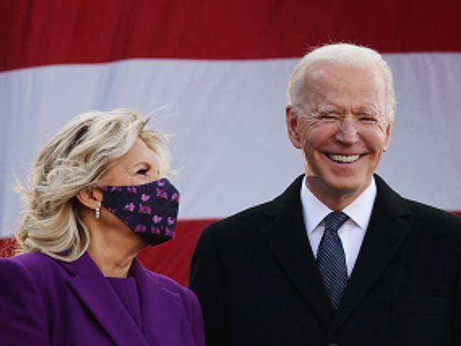 The day before taking office, Joe Biden and Dr Jill Biden participate in a departure ceremony at the Major Joseph “Beau” Biden III National Guard/Reserve Centre. Picture: Getty Images