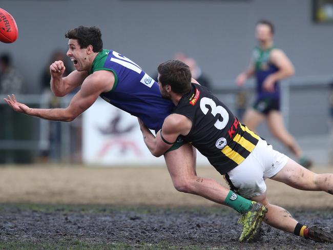 Football GFL, St Mary's v Colac at Anthony Costa Oval Geelong. St Mary's 16 Damian McMahon and Colac 3 Kody Spokes Picture: Mark Wilson