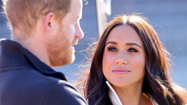 Prince Harry, Duke of Sussex and Meghan, Duchess of Sussex attend the Athletics Competition during day two of the Invictus Games at The Hague.