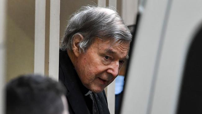 George Pell was escorted from the Supreme Court after losing his appeal last week. Picture: William West/AFP