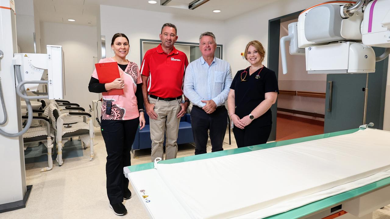 The $26.4 million Cairns Hospital emergency department expansion at the Cairns Hospital is complete, with six additional beds, a dedicated ED X-ray suite, new acute care rooms and upgraded resuscitation bays now being used by emergency patients. Cairns Hospital emergency department clinical nurse Lerisa Simpson-Harris, Member for Barron River Craig Crawford, Member for Cairns Michael Healy and clinical nurse Sharnee Dalglish inspect the emergency department's new X-ray suite. Picture: Brendan Radke