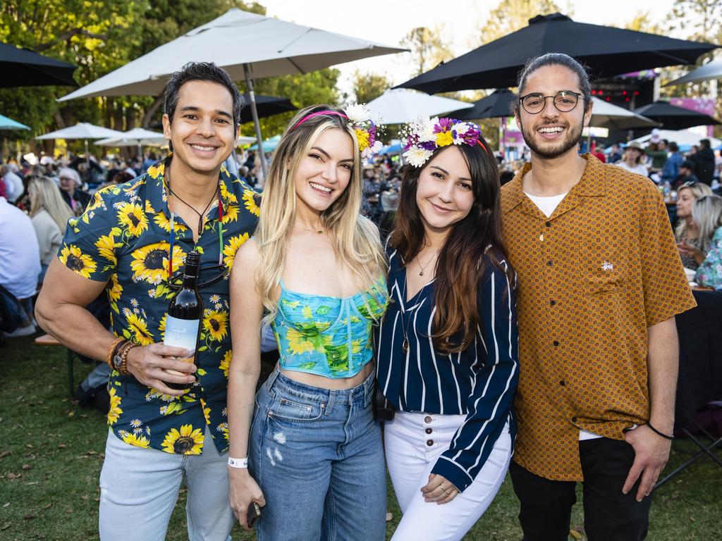 At the Festival of Food and Wine are (from left) Juan Serrano, Emmy Gomez, Tainara Eugenio and Gustavo Reis, Carnival of Flowers 2022, Saturday, September 10, 2022. Picture: Kevin Farmer