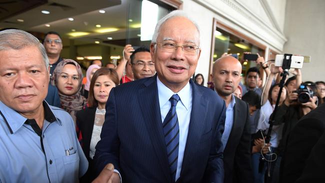 Former Malaysian prime minister Najib Razak outside the courthouse in Kuala Lumpur on December 12 after being charged in the 1MDB case. Picture: AFP