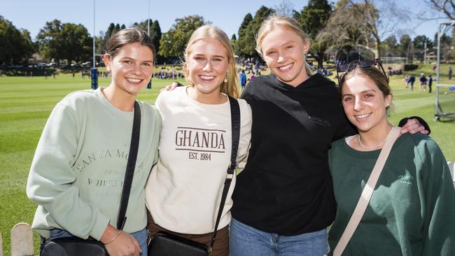 Backing Downlands are (from left) Gabby Boardman, Keziah Mayers, Molly McPherson and Tannah Hood on Grammar Downlands Day at Toowoomba Grammar School, Saturday, August 19, 2023. Picture: Kevin Farmer