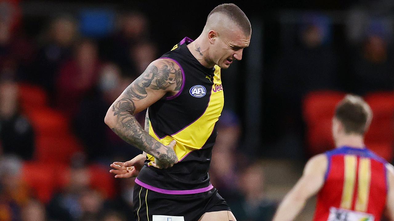 AFL Round 18. Richmond v Brisbane at Metricon stadium, Gold Coast . 16/07/2021. Richmonds Dustin Martin on all 4 after getting injured in a collision with Mitch Robinson of the Lions late 3rd qtr . Pic: Michael Klein