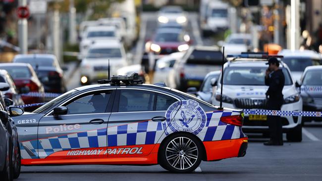 Ambush... the scene in Bondi Junction after Moradian’s shooting. Picture: Richard Dobson