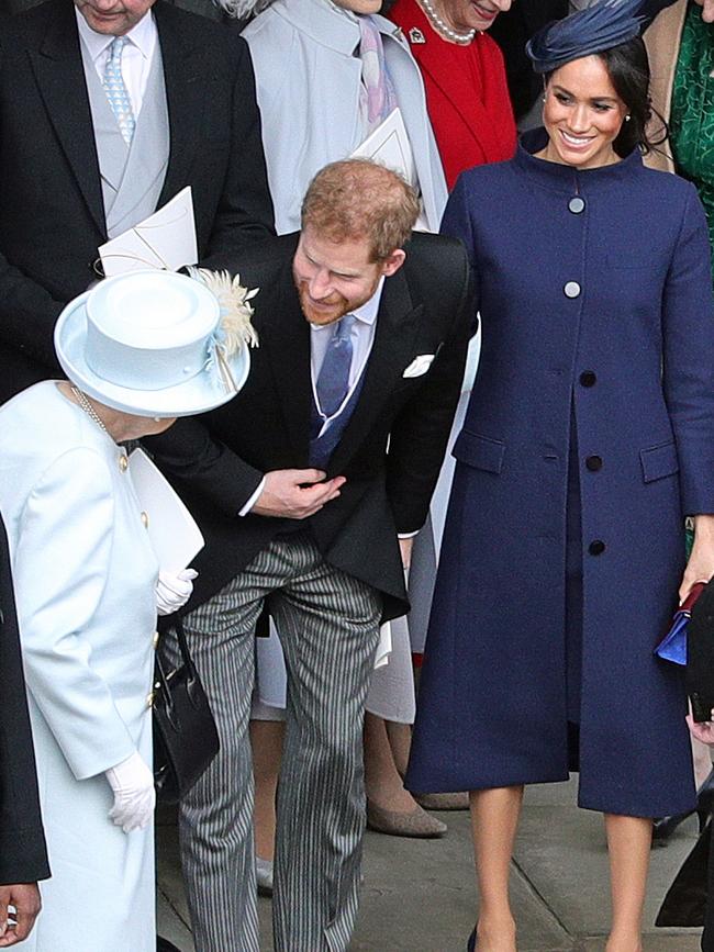 Meghan’s choice of outfit for the royal wedding sparked speculation that she may be pregnant just days before she flew to Sydney for the Invictus Games. Picture: AFP