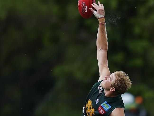 St Mary's Ryan Smith reaches for the ball.Picture: Keri Megelus