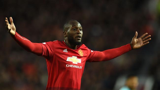 Manchester United's Belgian striker Romelu Lukaku gestures during the English Premier League football match between Manchester United and Newcastle at Old Trafford in Manchester, north west England, on October 6, 2018. (Photo by Oli SCARFF / AFP) / RESTRICTED TO EDITORIAL USE. No use with unauthorized audio, video, data, fixture lists, club/league logos or 'live' services. Online in-match use limited to 120 images. An additional 40 images may be used in extra time. No video emulation. Social media in-match use limited to 120 images. An additional 40 images may be used in extra time. No use in betting publications, games or single club/league/player publications. /