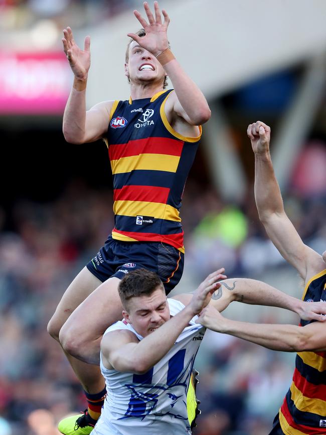 Jordan Dawson flies high. Picture: Sarah Reed/AFL Photos via Getty Images