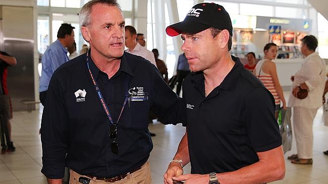 Champion Cadel Evans, right, at Adelaide Airport with Tour Down Under director Mike Turter. Picture: Morne de Klerk.