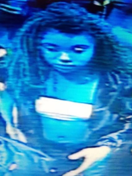 An image of a woman police would like to speak to after an alleged assault in Southbank.