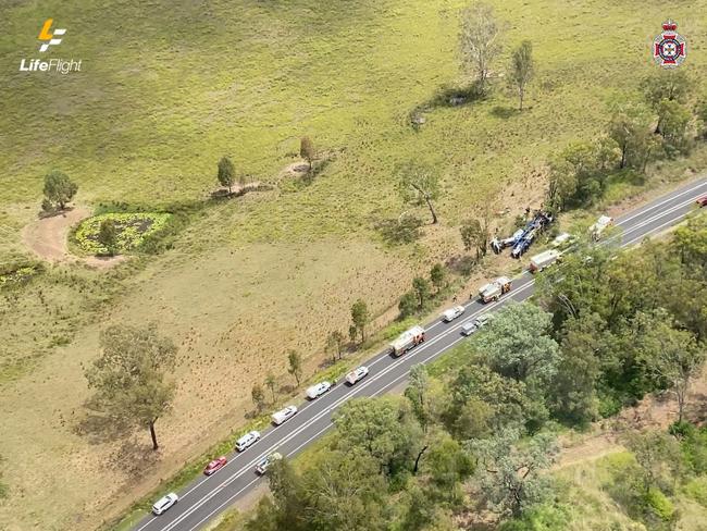 Fireys have worked for more than two hours to free a truck driver man left trapped by a tree following a serious two-vehicle head-on crash at the Carmans Rd and Bruce Highway intersection at Monduran. Photo: Lifeflight