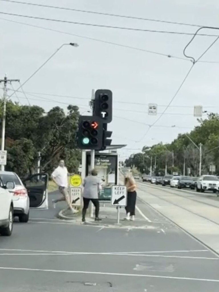 A bystander rushes in to end the fight. Picture: Today