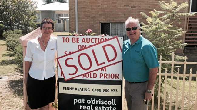 Pat O'Driscoll agents Penny Keating and Doug Webber sold 56 Agnes St, The Range at auction over the weekend.