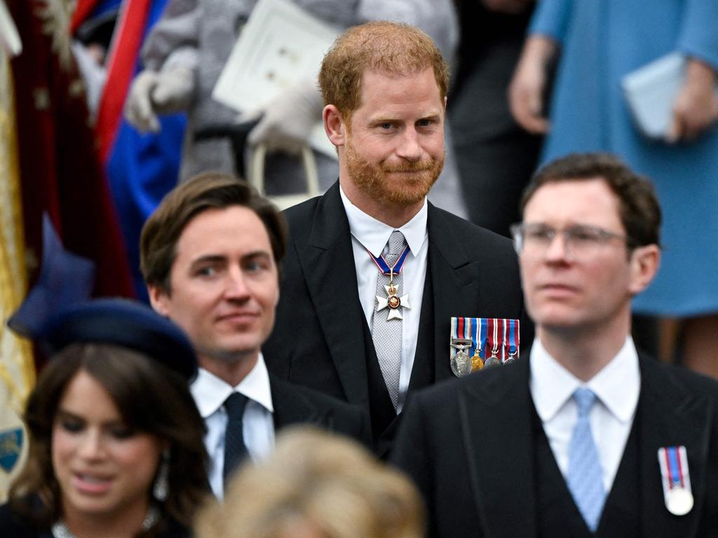 Prince Harry looked lonely and awkward as he arrived at Westminster Abbey. Picture: AFP