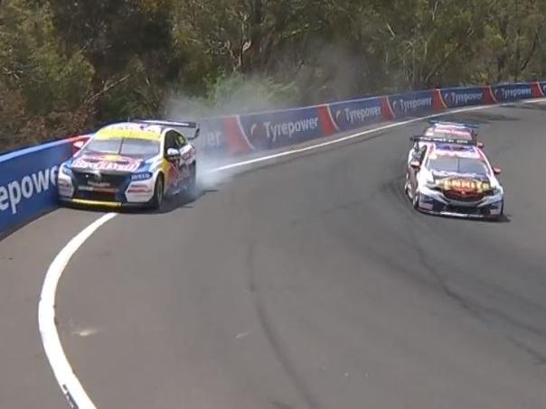 Jamie Whincup slams into the wall