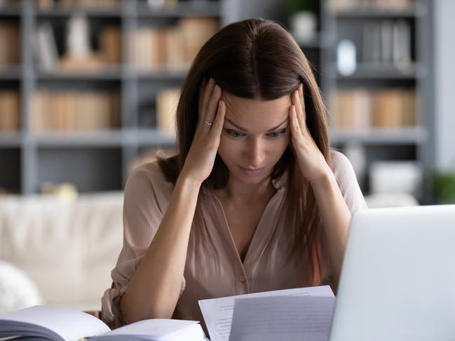 MONEY ISTOCK -  Stressed young woman holding head in hands, feeling desperate about financial problems, dismissive notice, failed test. Depressed businesswoman shocked by bank loan rejection, domestic bills. Picture: Istock