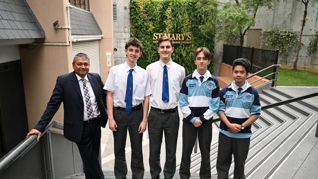 St Mary’s Cathedral College students after their Modern History exam with their teacher. Left to right: Ashley Pereira (Instructional Leader of HSIE), Will Kelleher, Harry Reed, Harry Abbey and Dylan Tran. Picture: Supplied