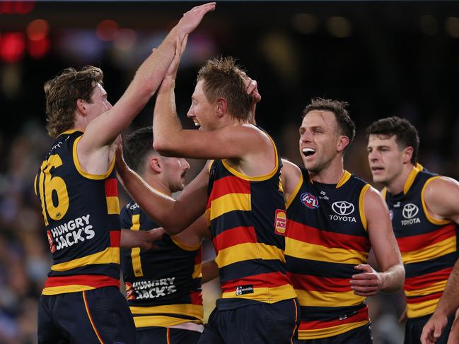 Kieran Strachan celebrates kicking his first goal in AFL football. Picture: James Elsby/AFL Photos via Getty Images.