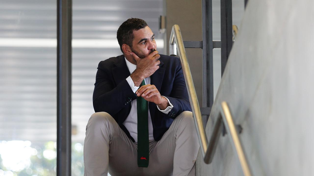 Greg Inglis sits on a stairwell in the moments before announcing his retirement from rugby league. Picture: Brett Costello