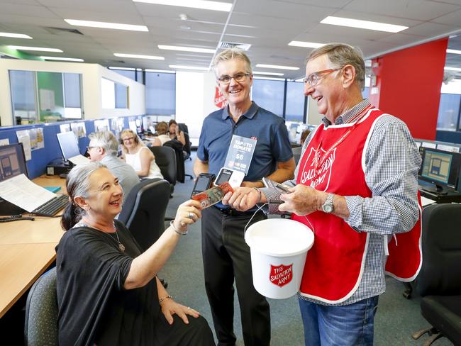 Promoting the Salvation Army Desk Knock at the Apple marketing Group are (from left) Leanne Dalby, Salvation Army funding and PR manager Rowan Johnstone and Andre van Dalen from the Apple marketing Group. Pic Tim Marsden