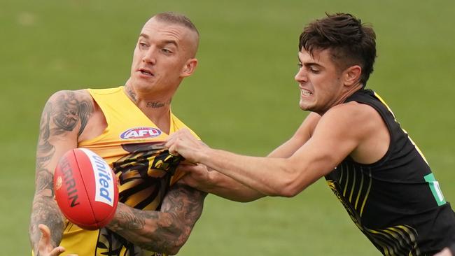 Dustin Martin of the Tigers is tackled by Patrick Naish of the Tigers during a Richmond Tigers AFL intraclub match at Punt Road Oval in Melbourne, Thursday, February 20, 2020. (AAP Image/Scott Barbour) NO ARCHIVING