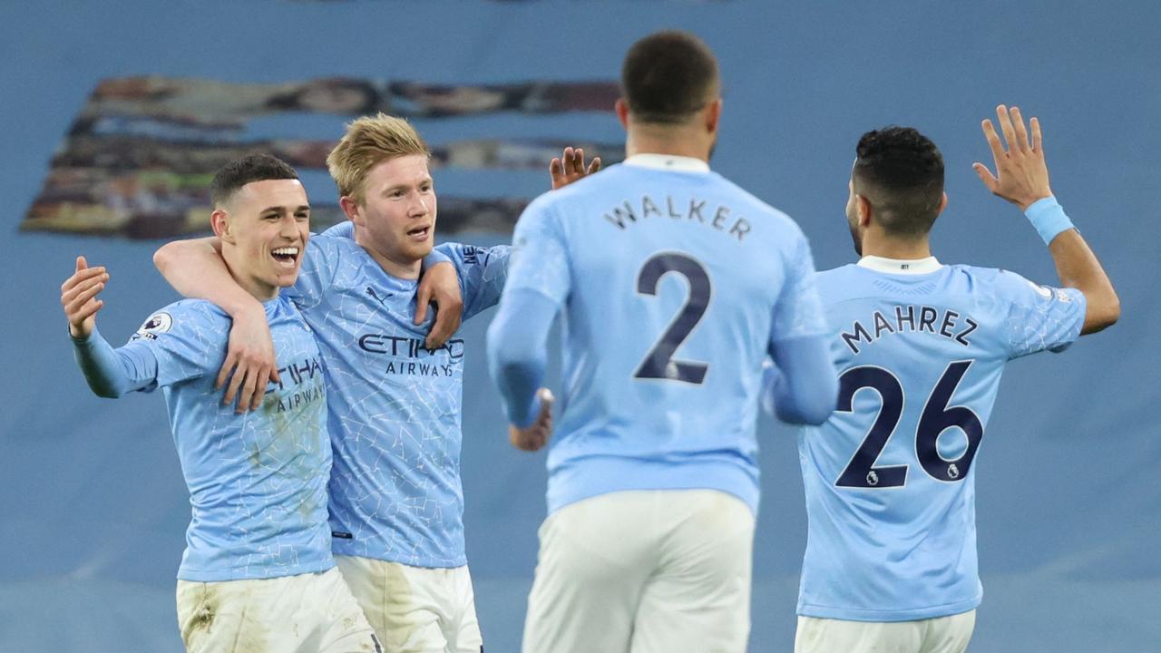 Manchester City are closing in on yet another title (Photo by Clive Brunskill / POOL / AFP)